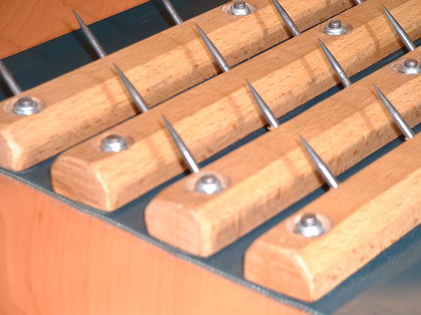 Esbelt conveyor belt with beechwood monoblock and pins