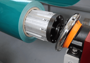 Esbelt Automatic Slitter-Axles Expandable pneumatic axles with safety lock.